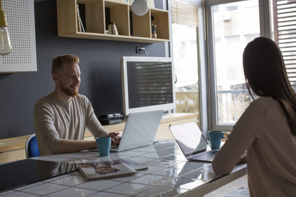 couple with laptops working at home 2026 03 09 04 59 09 utc