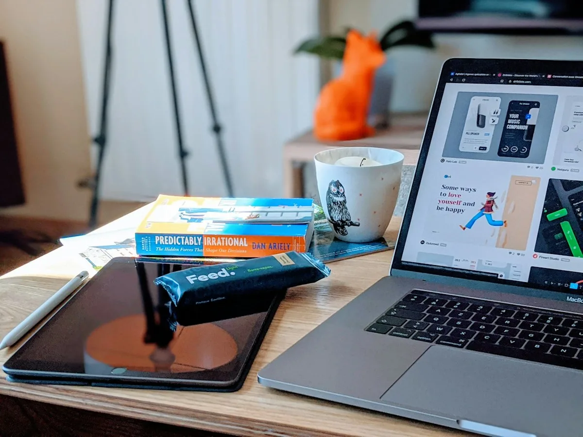 tvorba webstránok Bratislava - macbook pro beside white ceramic mug on brown wooden table
